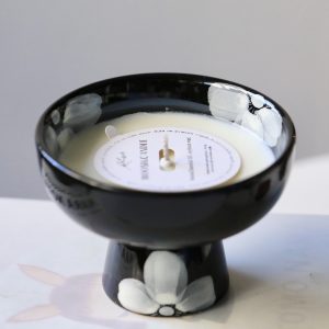 Hand-painted floral ceramic bowl scented candle with white wax.