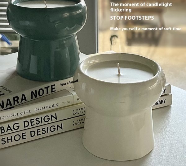 Small Bowl with High Feet Candle in Green and White on Books